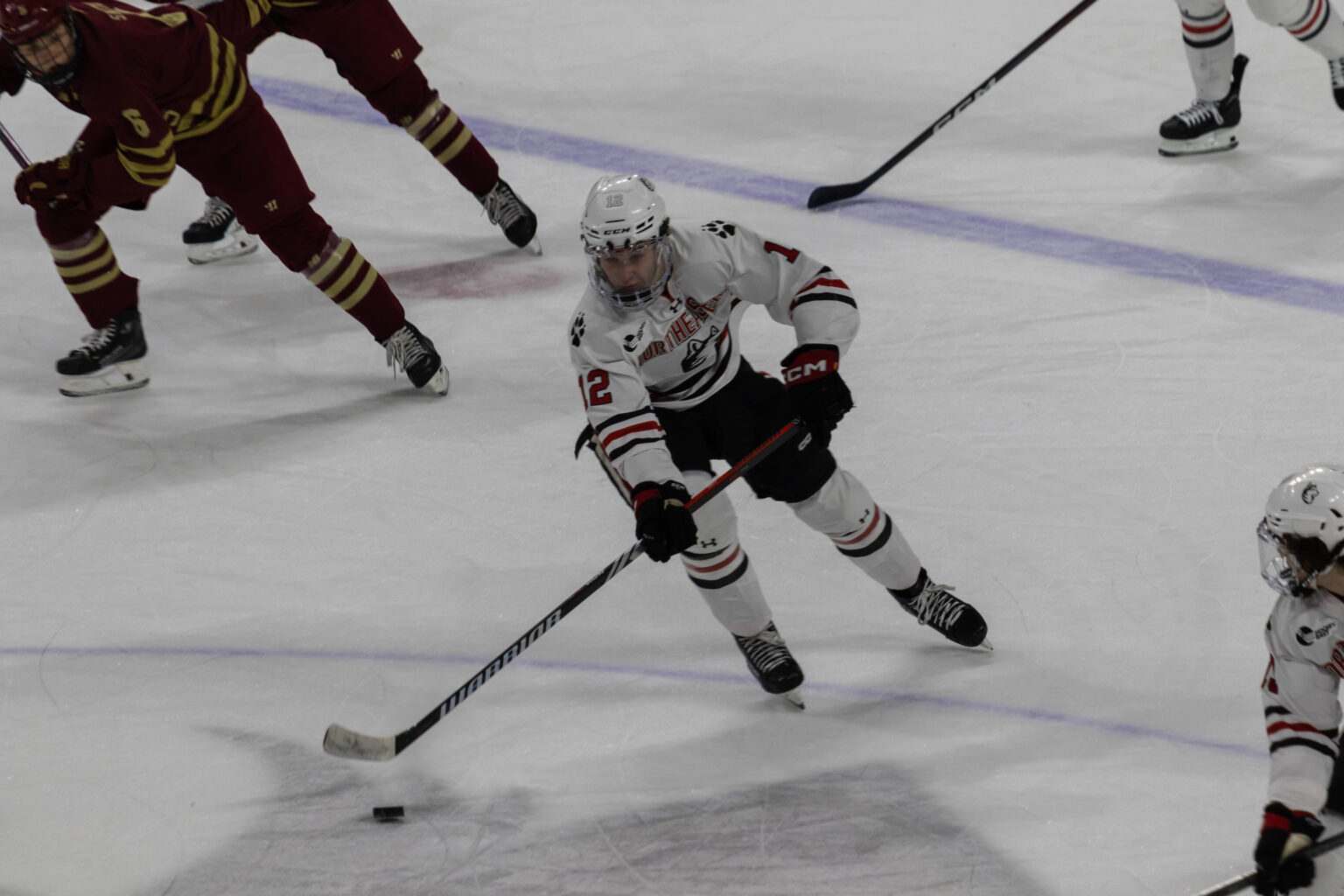 Behind Cam Lund’s hat trick, Huskies pull thrilling upset over top